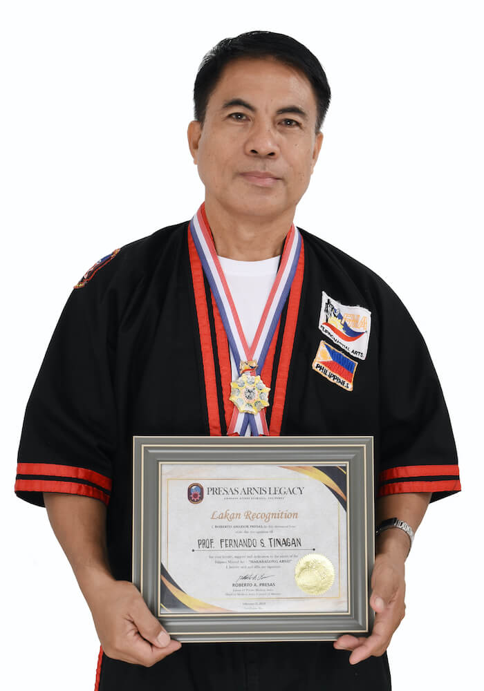 UPV PE prof receives International  Modern Arnis Black Belt Recognition during IMAFP and MATTI Gathering